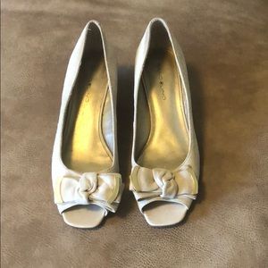 Nude faux suede peep toe wedges